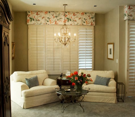 traditional master bedroom with chandelier